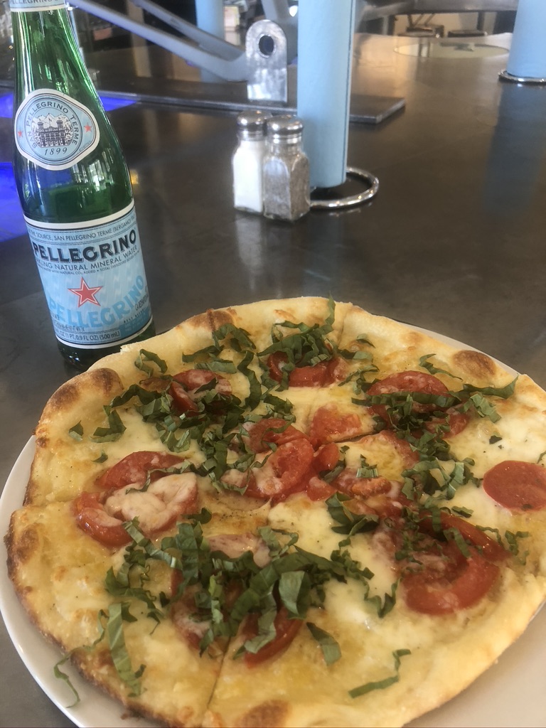 Fresh tomato and basil pizza at Power House