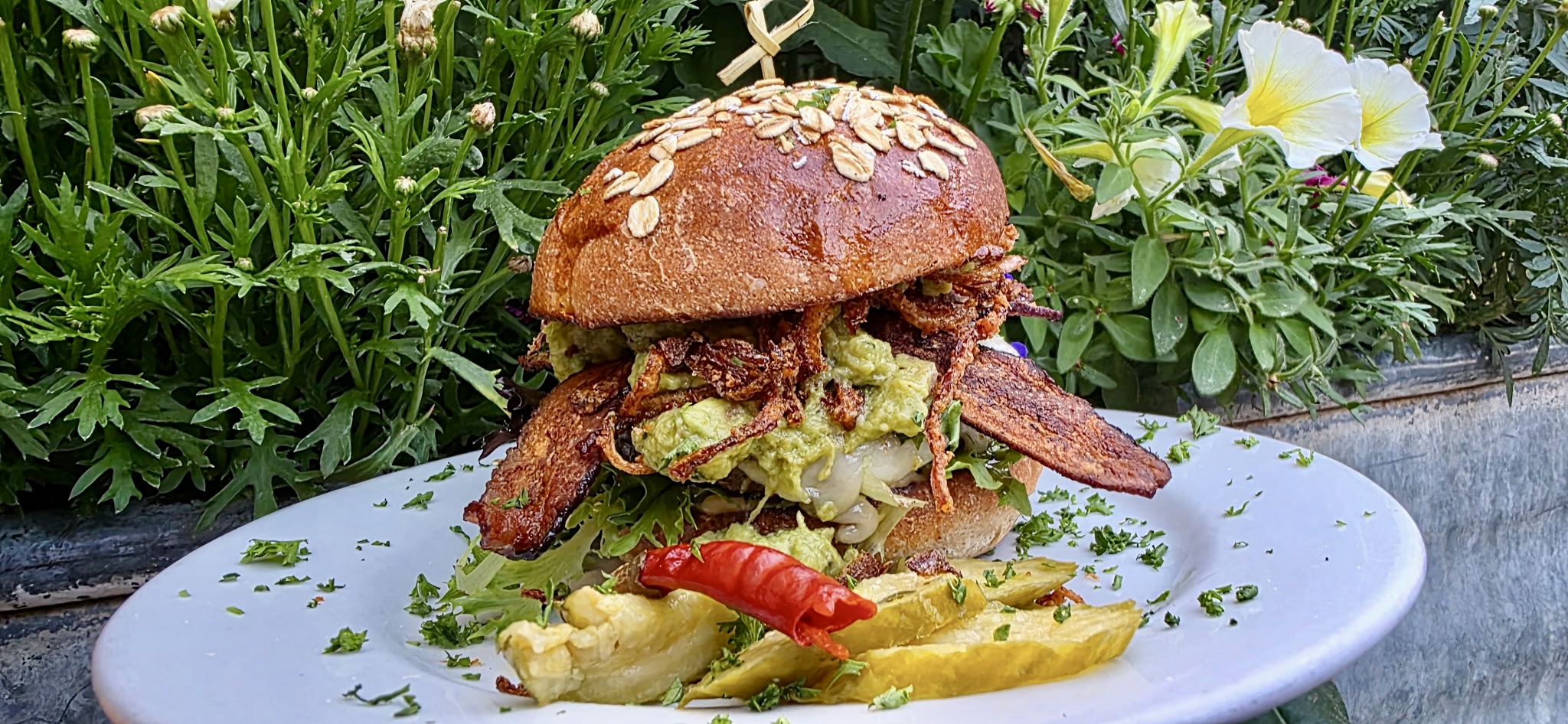 Power House burger with bacon, guacamole and crispy onions